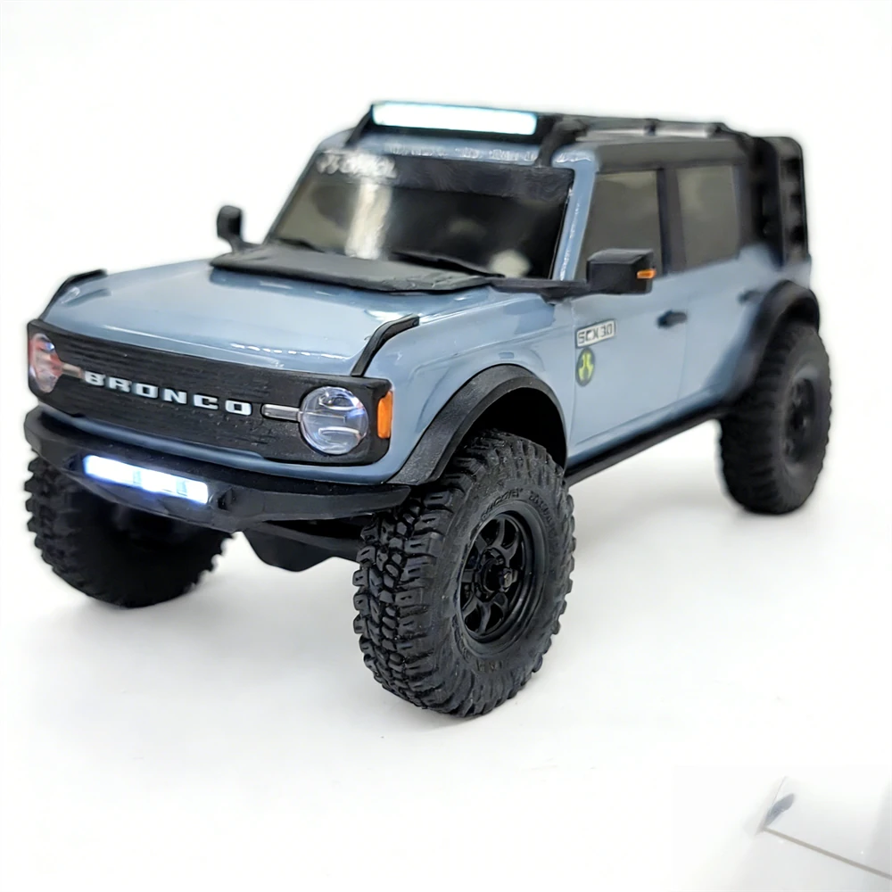Upgraded Headlights Roof Bumper Angel Eye Spare Tire Holder LED Lights for Jeep for Ford Bronco Axial SCX30 1/30 Micro Off-Road Truck RC Cars Vehicles Models Parts — view 8